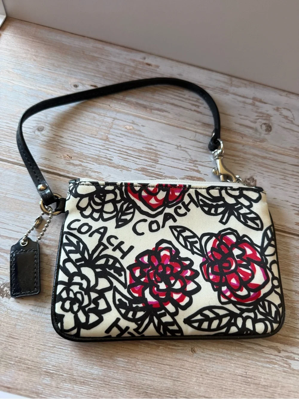 Coach Floral Wristlet in White and Red doodle